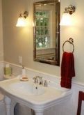An elegant bathroom in a quaint Tudor style home